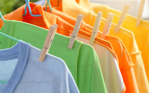 colourful array of shirts hanging out to dry