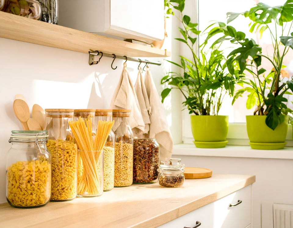 airtight glass storage containers full of grains and pasta
