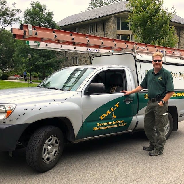 Pest Control expert with his van